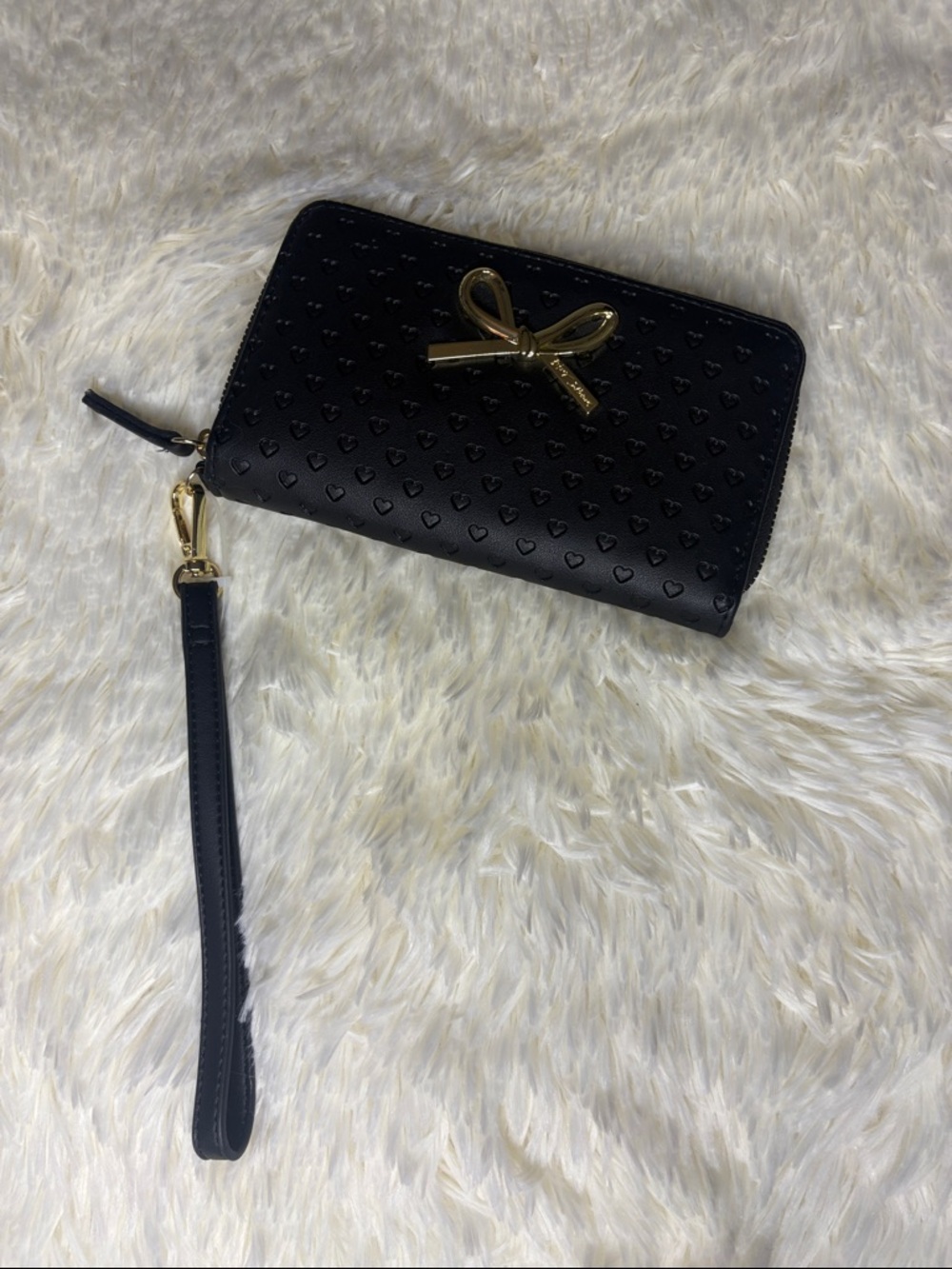 Chic Black Wristlet Clutch with Gold Bow Accent